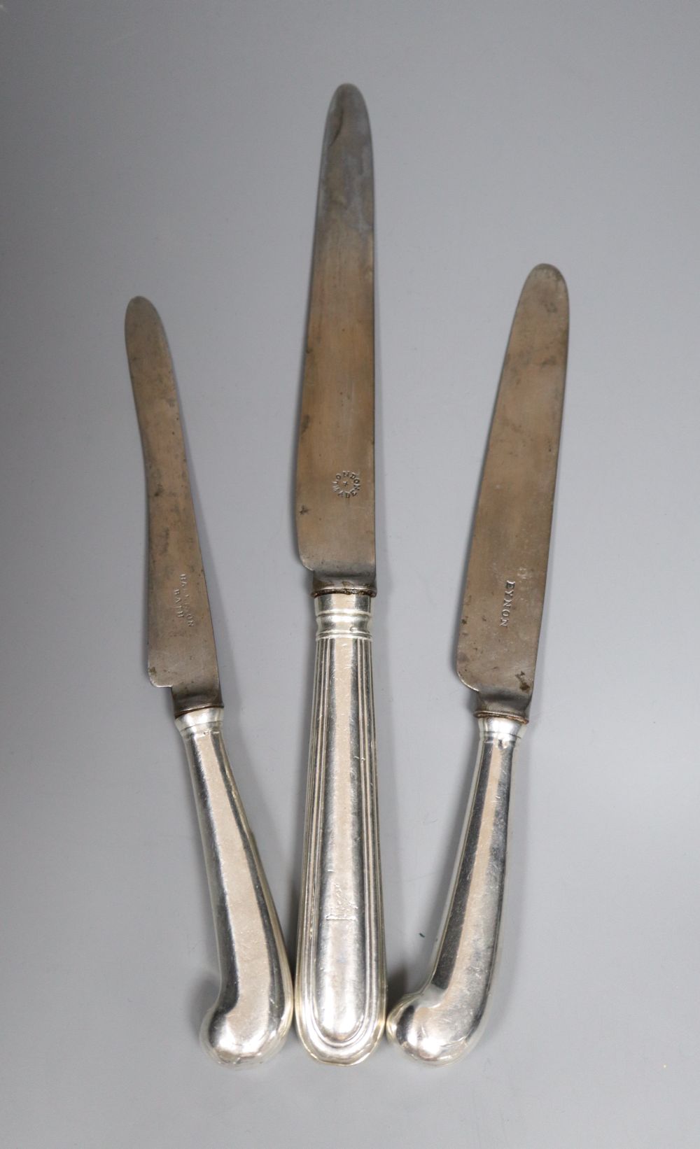A matched set of twelve 19th century silver thread pattern table knives and a set of twelve pistol handles dessert knives.